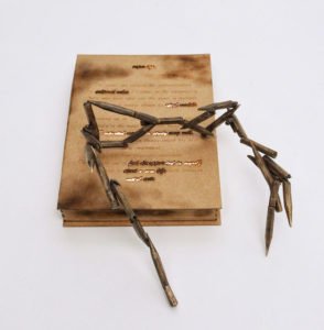 8. Super Ego: Studying - Bronze, cardboard, led lights